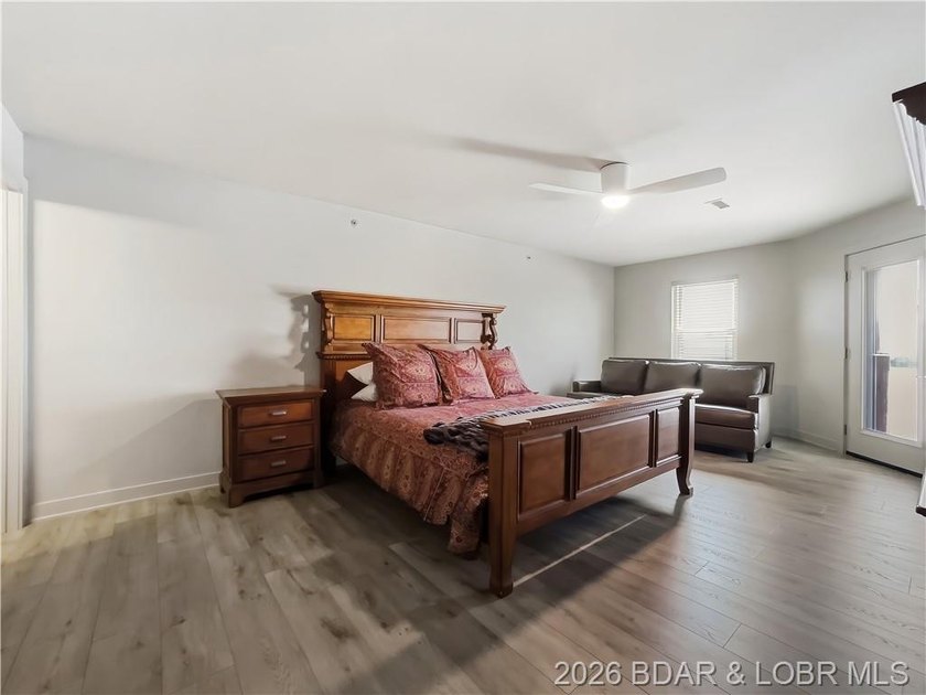 Turnkey luxury and breathtaking lakefront views await in this - photo 27