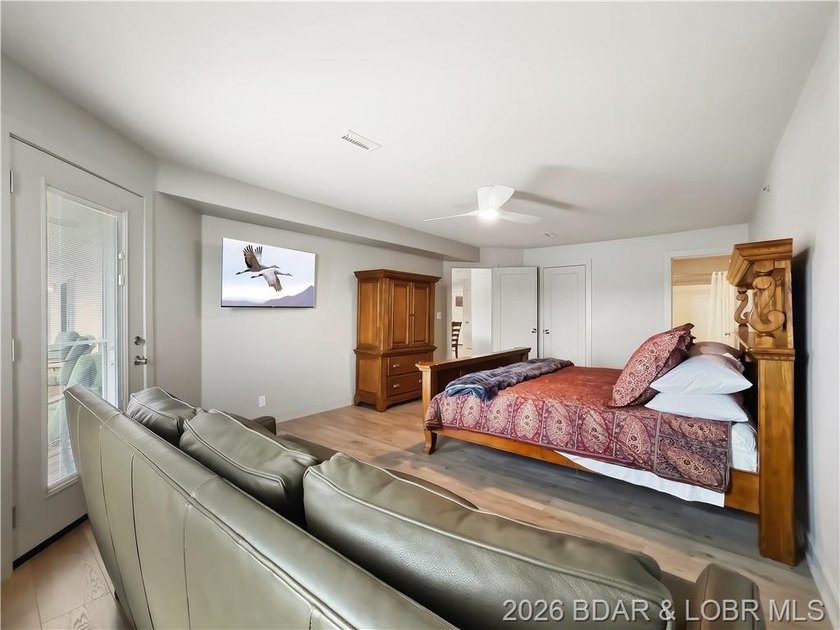Turnkey luxury and breathtaking lakefront views await in this - photo 28