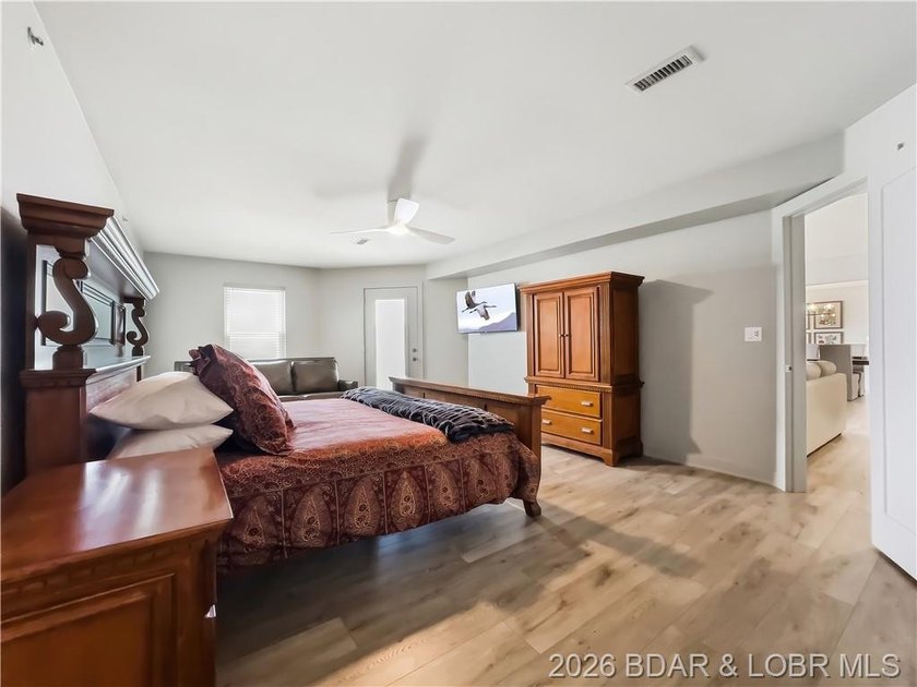 Turnkey luxury and breathtaking lakefront views await in this - photo 29