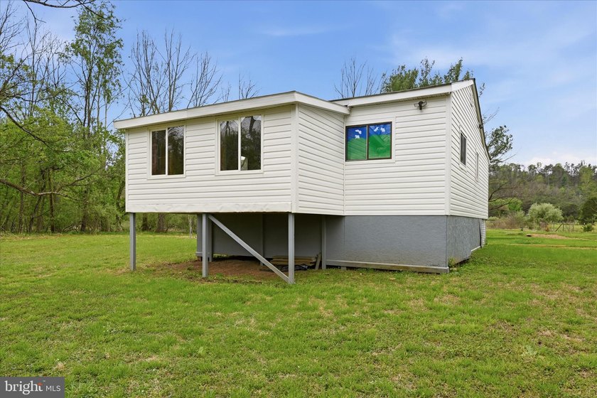 NEW PRICE ON THREE RIVERFRONT ACRES! Get away from it all only - photo 32