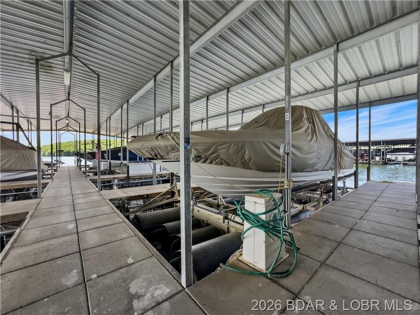 Turnkey luxury and breathtaking lakefront views await in this - photo 45
