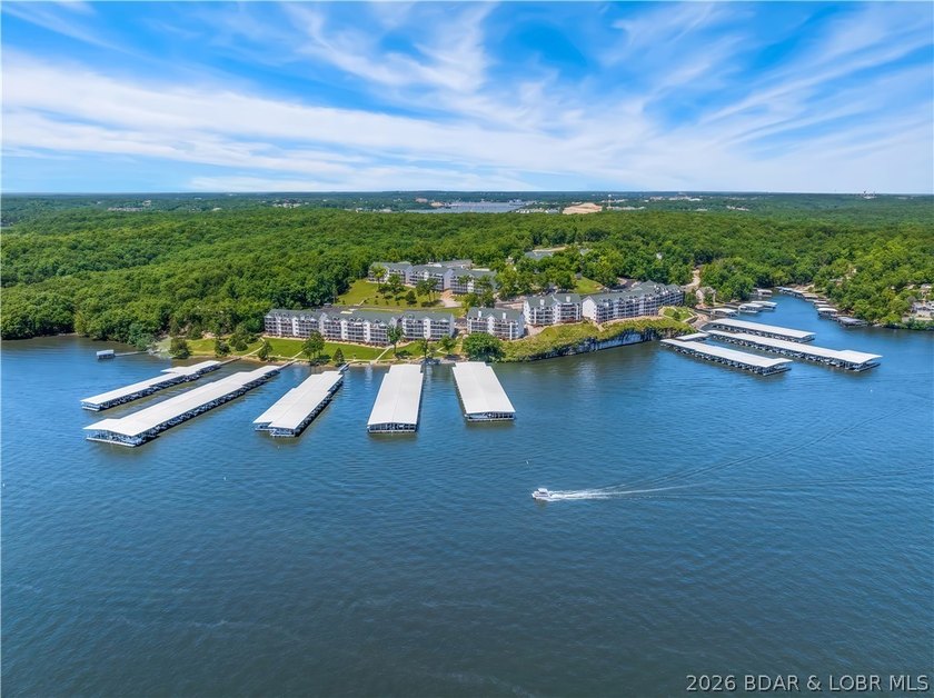 Turnkey luxury and breathtaking lakefront views await in this - photo 49