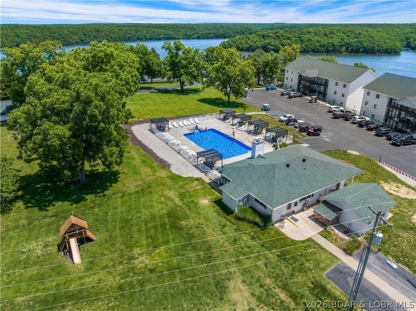 Turnkey luxury and breathtaking lakefront views await in this - photo 52