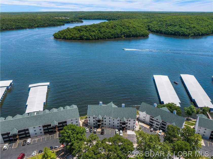 Turnkey luxury and breathtaking lakefront views await in this - photo 55