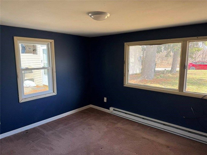 Welcome to this charming ranch-style home in Oswego, NY, ideally - photo 11