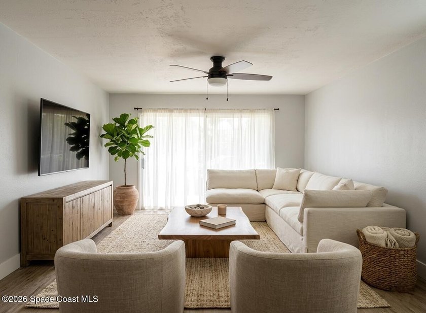Dreaming of salt air and easy living? This charming ground-floor - photo 3