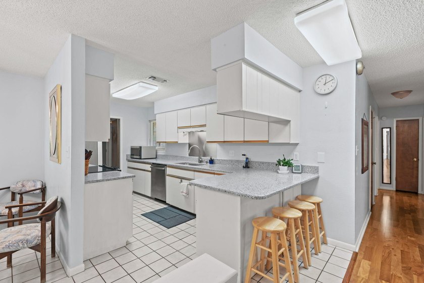 Ultimate Coastal Oasis: 4BR Home on Rare .553 Acre with Private - photo 15
