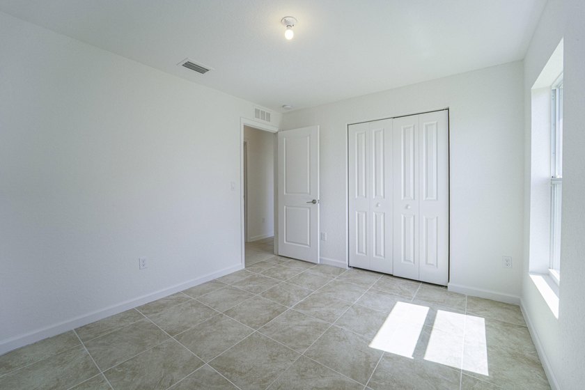 Beautiful updated 4 bedroom home in a gated community. New - photo 15