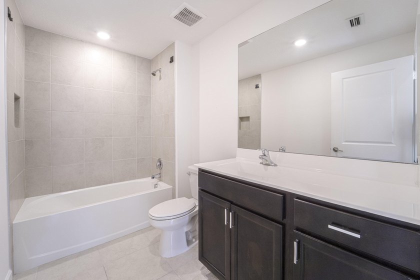 Beautiful updated 4 bedroom home in a gated community. New - photo 16