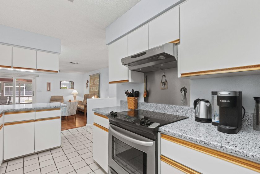 Ultimate Coastal Oasis: 4BR Home on Rare .553 Acre with Private - photo 17