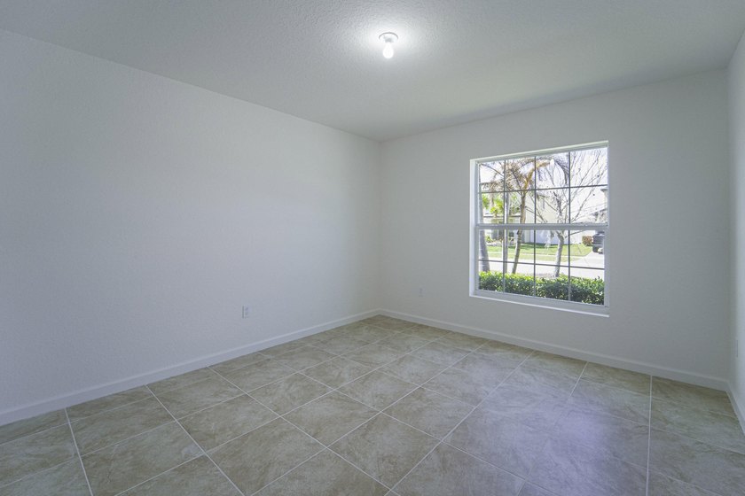 Beautiful updated 4 bedroom home in a gated community. New - photo 17