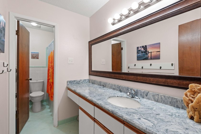 Ultimate Coastal Oasis: 4BR Home on Rare .553 Acre with Private - photo 31