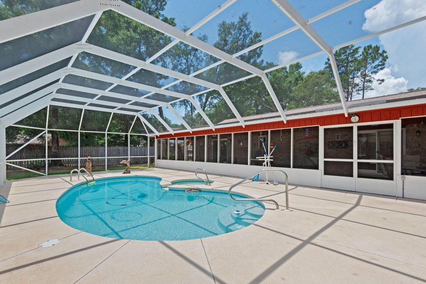 Ultimate Coastal Oasis: 4BR Home on Rare .553 Acre with Private - photo 40