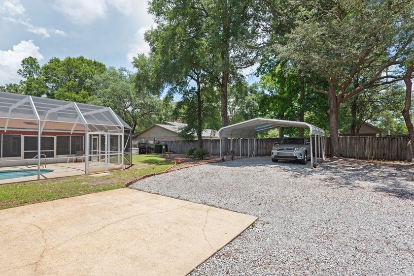 Ultimate Coastal Oasis: 4BR Home on Rare .553 Acre with Private - photo 49