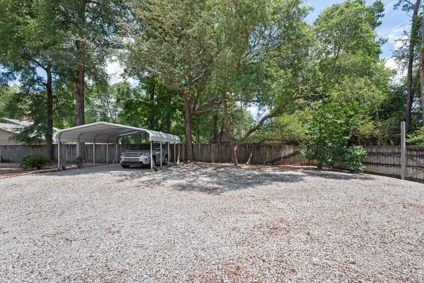 Ultimate Coastal Oasis: 4BR Home on Rare .553 Acre with Private - photo 50