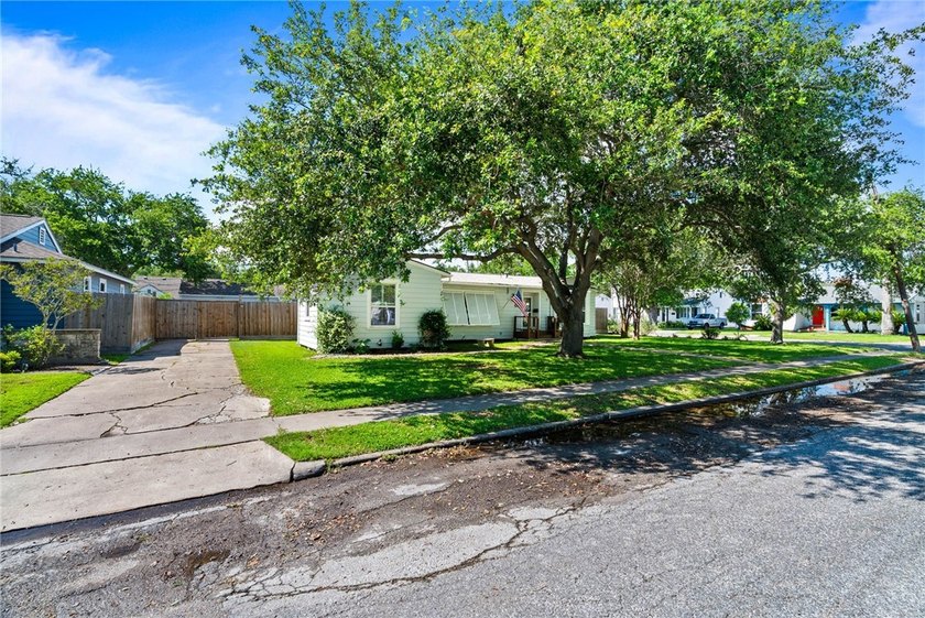 This beautifully updated 4-bedroom, 2.5-bath home offers the - photo 3