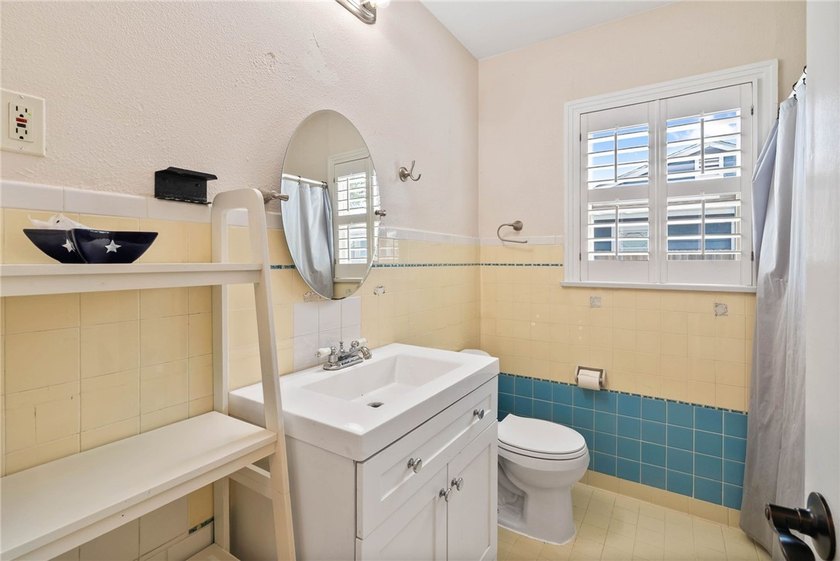 This beautifully updated 4-bedroom, 2.5-bath home offers the - photo 6