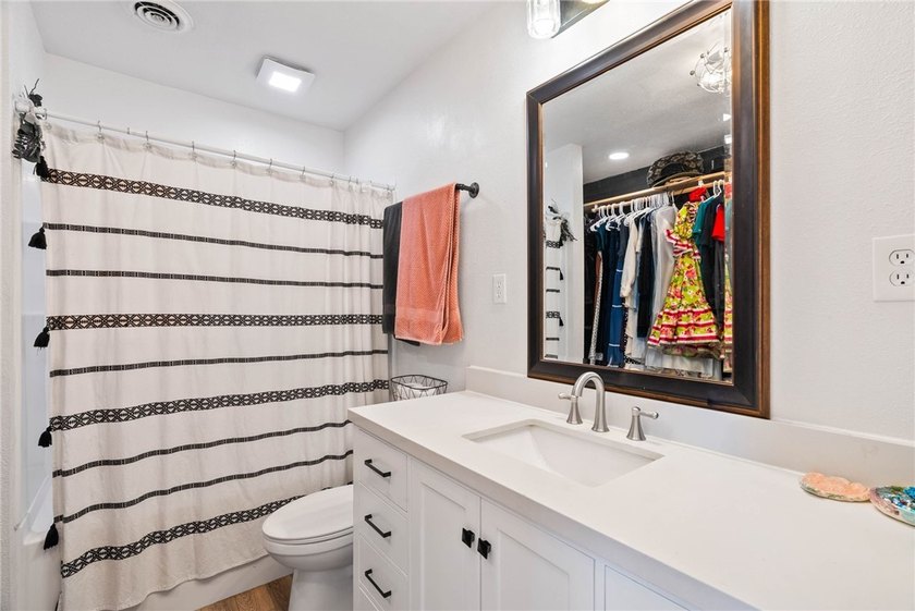 This beautifully updated 4-bedroom, 2.5-bath home offers the - photo 9
