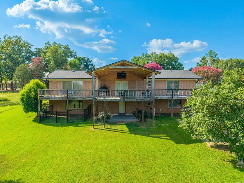Experience the best of lake living with this beautifully updated - photo 50