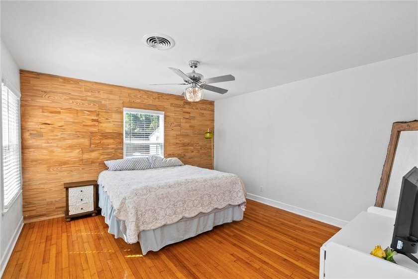 This beautifully updated 4-bedroom, 2.5-bath home offers the - photo 10