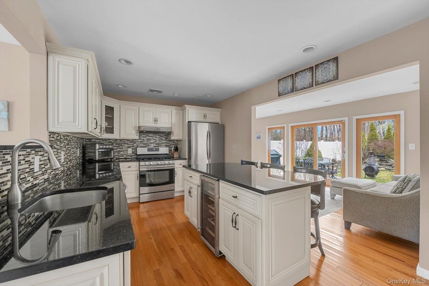 Stop looking and start packing! Beautifully renovated within the - photo 7