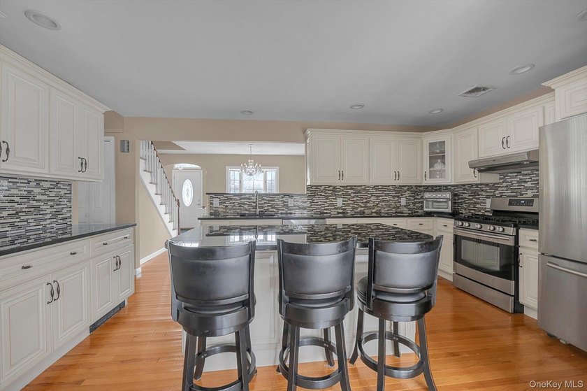 Stop looking and start packing! Beautifully renovated within the - photo 8