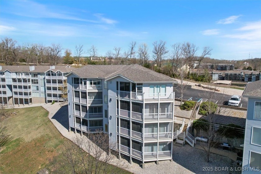 Walk-in from the Parking Lot! End Unit! Turn-Key! Great views of - photo 2