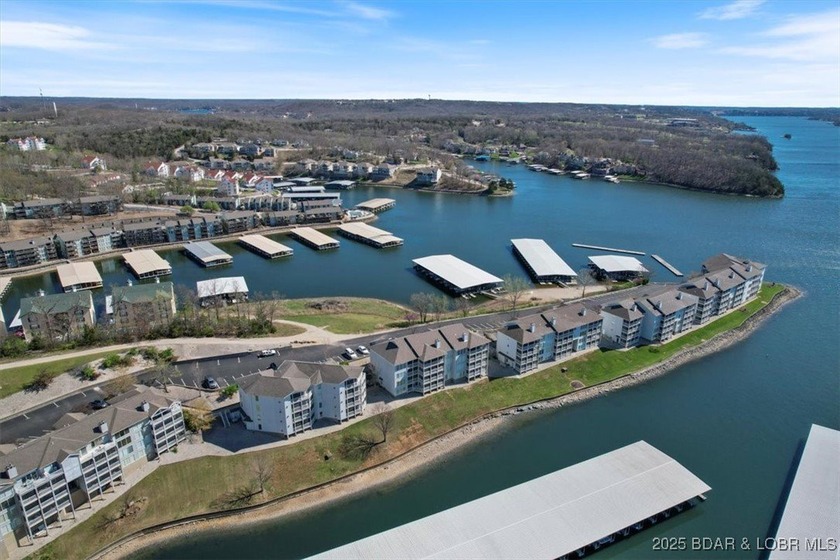 Walk-in from the Parking Lot! End Unit! Turn-Key! Great views of - photo 6