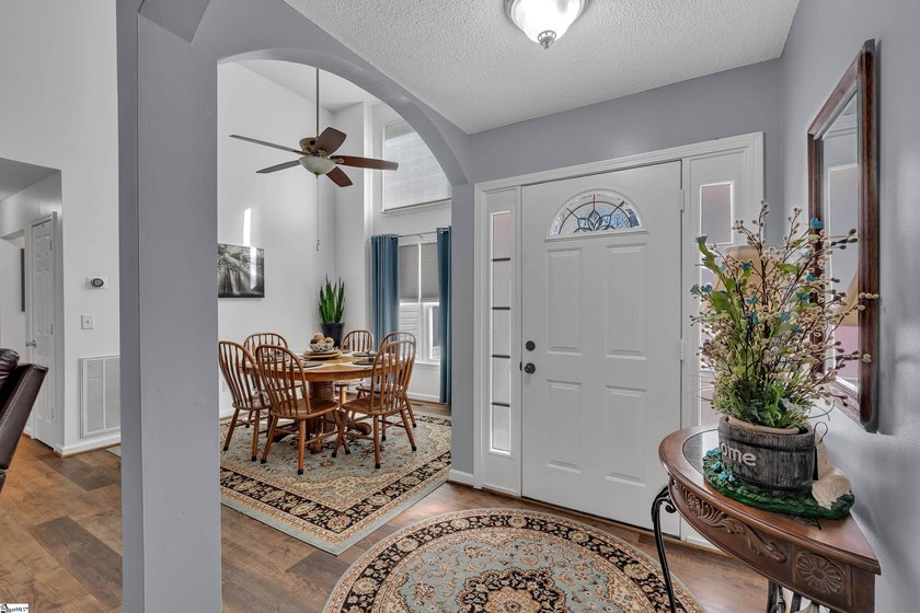 Welcome home to this charming split-bedroom RANCH, a - photo 3