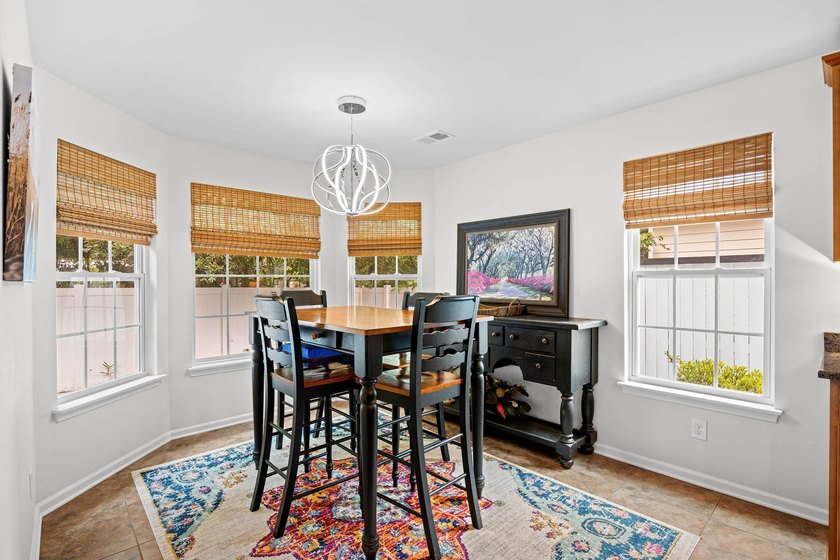 This 3 bed/2 bath charming coastal cottage is nestled within The - photo 15