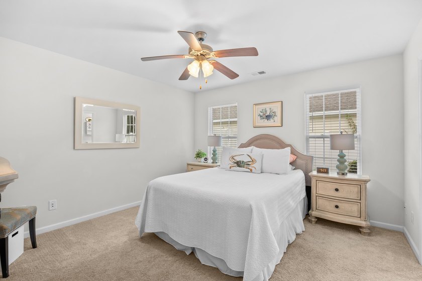This 3 bed/2 bath charming coastal cottage is nestled within The - photo 18