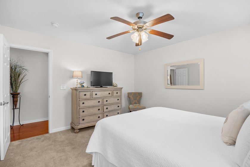 This 3 bed/2 bath charming coastal cottage is nestled within The - photo 19
