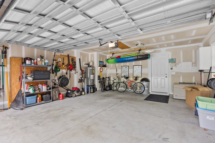 This 3 bed/2 bath charming coastal cottage is nestled within The - photo 29