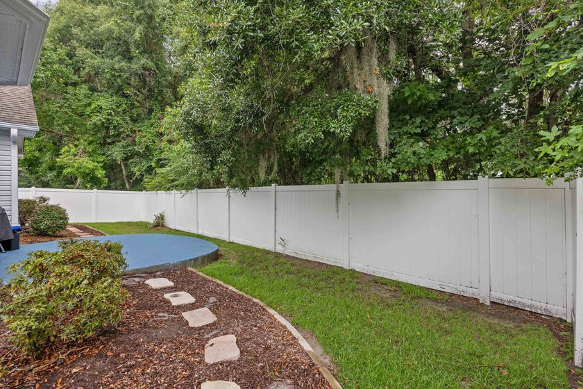 This 3 bed/2 bath charming coastal cottage is nestled within The - photo 34