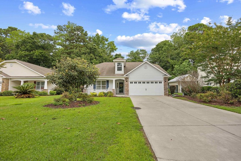 This 3 bed/2 bath charming coastal cottage is nestled within The - photo 40