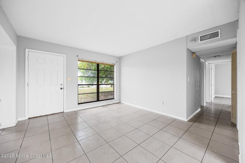 Discover this charming corner-lot home, freshly painted and - photo 2
