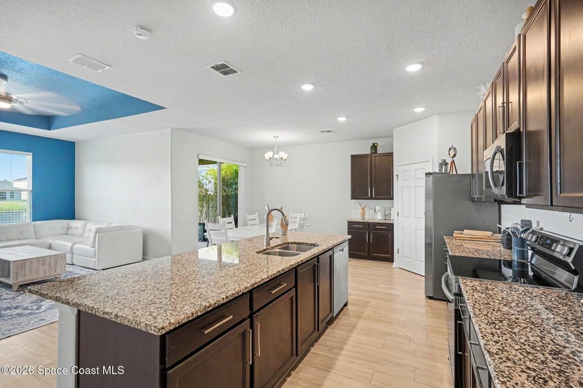 Better than new and move-in ready! This beautifully maintained - photo 8