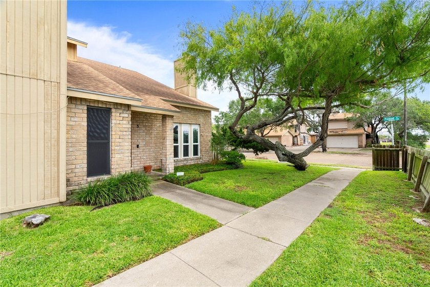Welcome home to this beautifully updated end-unit townhome - photo 2