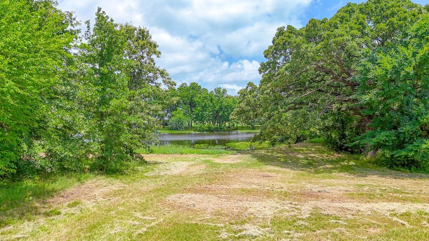 Beautiful 1 acre lot with pond in a gated community. Welcome to - photo 5