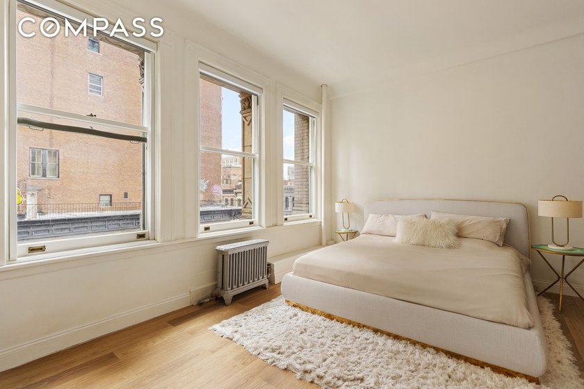 Perched on a high floor, soaring above height-restricted SOHO - photo 9