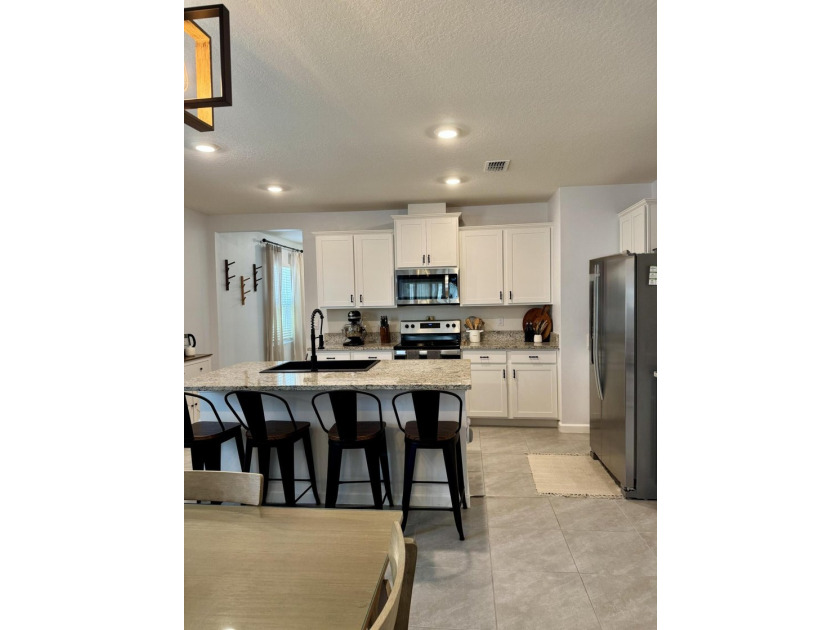 Welcome to this beautifully upgraded 3-bedroom, 2-bath CBS home - photo 11