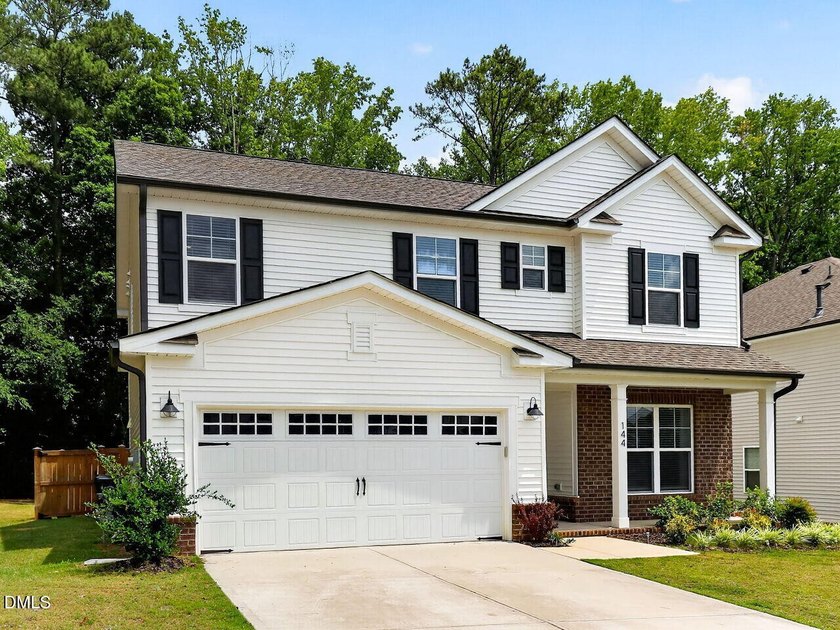 Welcome to 144 Orchard Peach Road, where comfort, convenience - photo 2