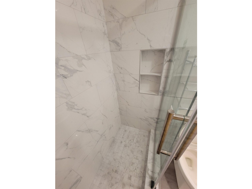 Welcome to this beautifully remodeled first floor 2-bed 2-bath - photo 14