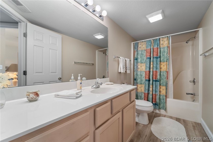 Walk-in level lakefront living in sought-after Bristol Bay! This - photo 19