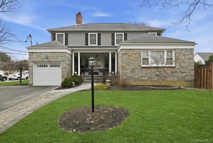 Welcome to this spacious and beautifully maintained stone-front - photo 3
