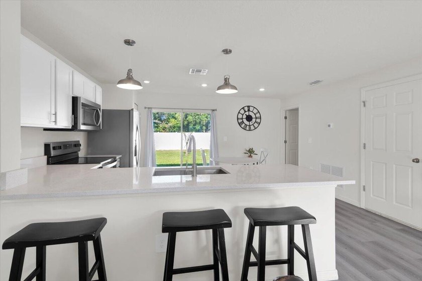 Built in 2024 and upgraded beyond builder grade, this - photo 13