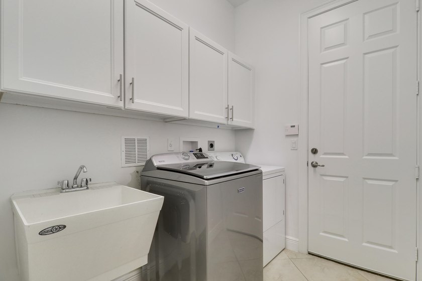 Located in one of Jupiter's most sought-after gated communities - photo 30