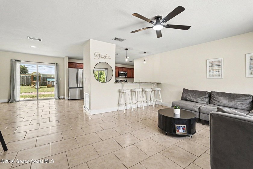 Move-In Ready with a Brand New Roof! You immediately get that - photo 4