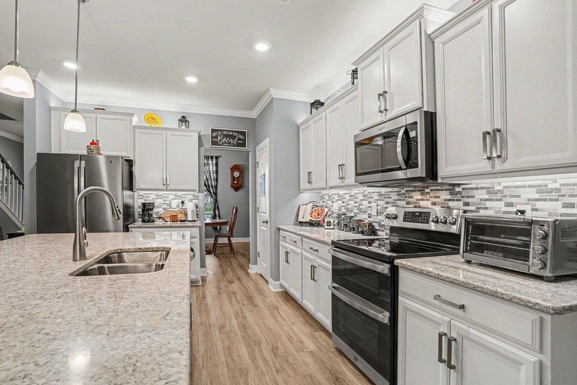 Welcome to this exceptional 6-bedroom, 3.5-bath home nestled on - photo 11