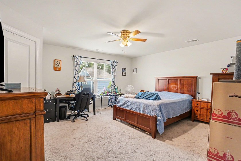 Welcome to this exceptional 6-bedroom, 3.5-bath home nestled on - photo 22